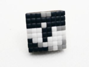 Tales of Us Pin